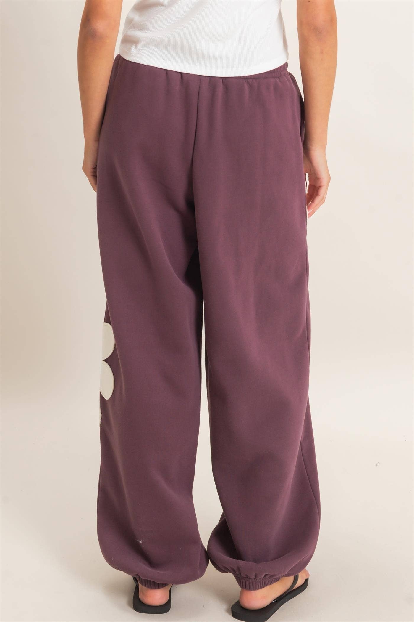Floral Applique Drawstring Jogger Pants: BLACK